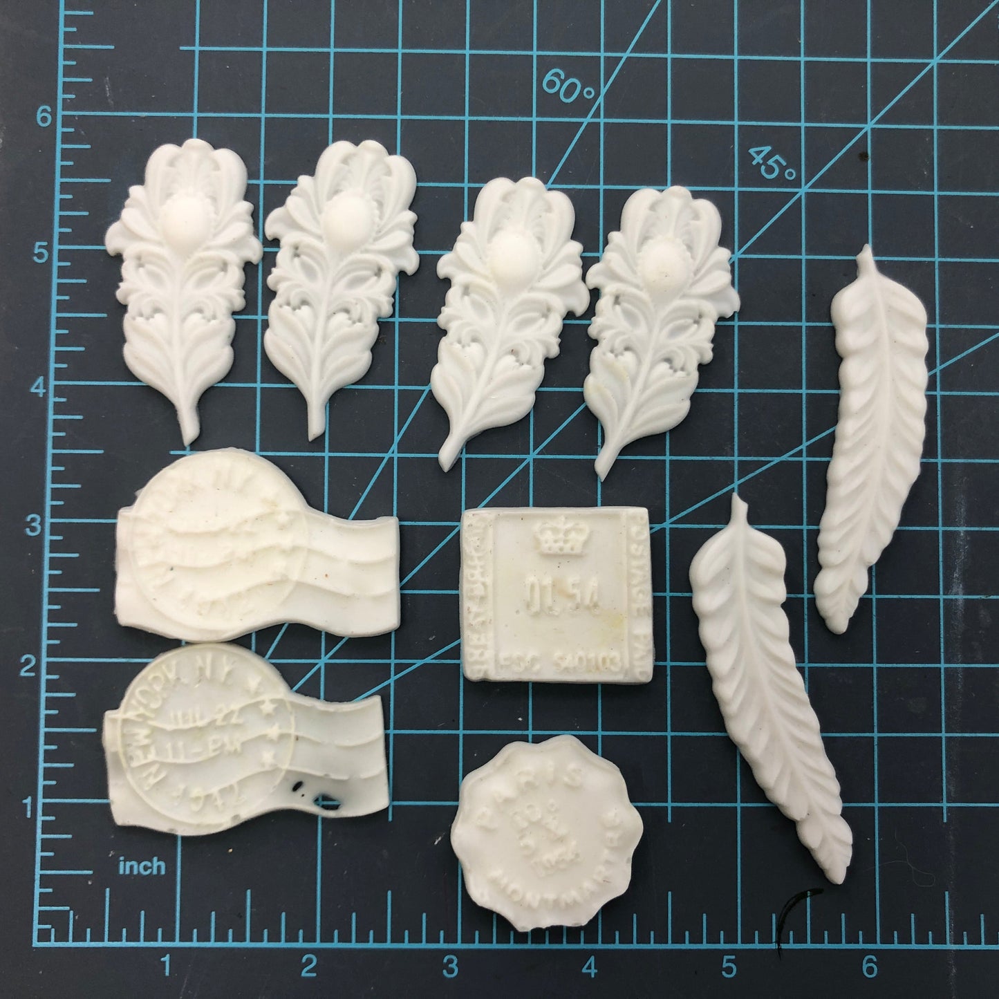 LOT of 12, Pre-Cast Mould, Resin, Feathers, Postage Stamps, Clocks
